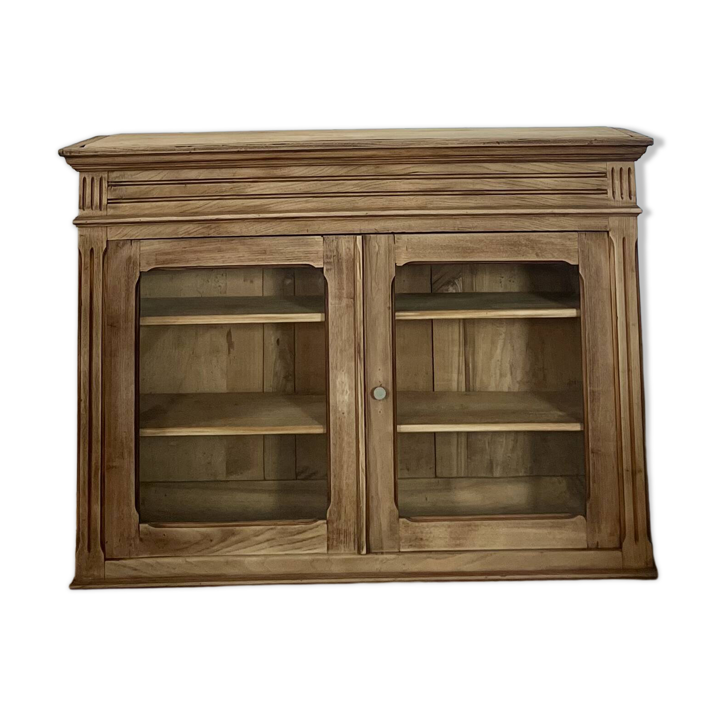 Old glass-fronted Parisian buffet in raw solid wood