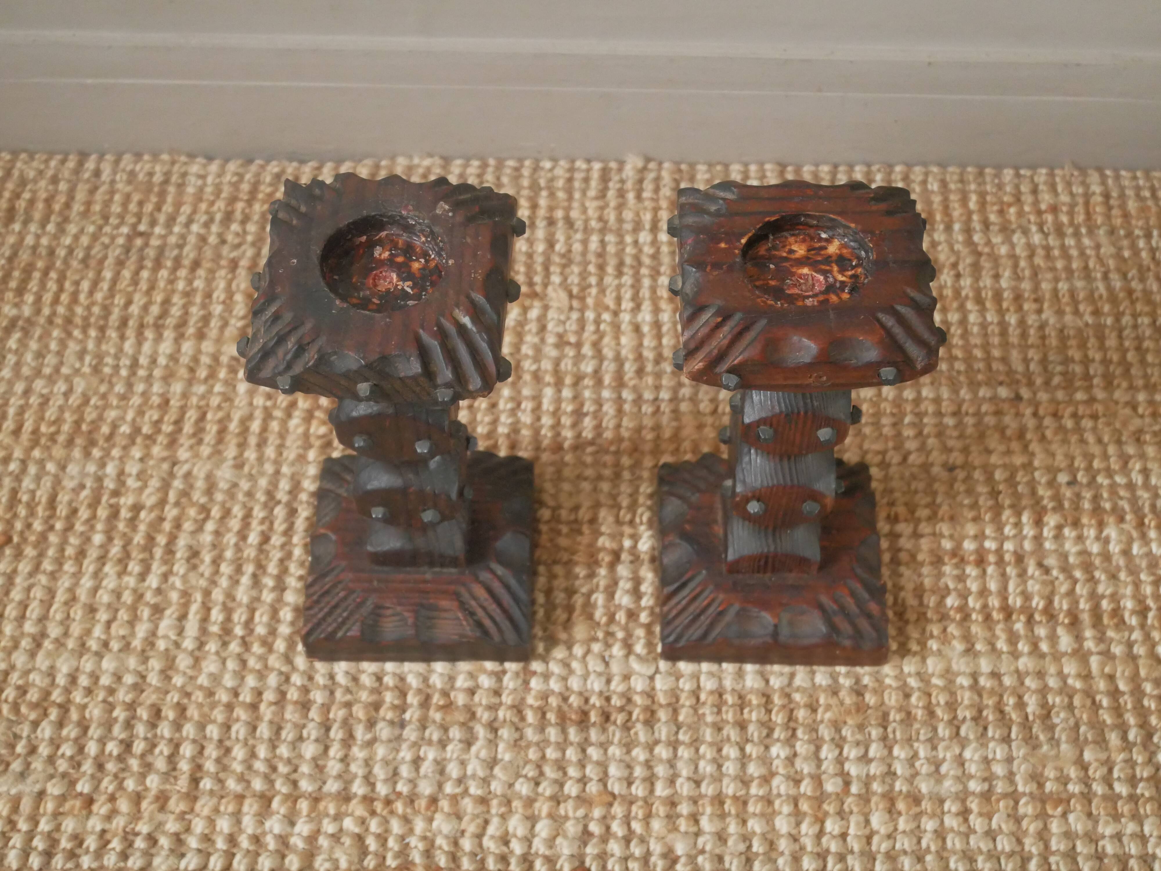 Pair of carved wood candlesticks iron nails handcrafted brutalist design candlesticks