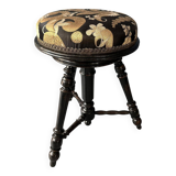 Small black round-cushionstool