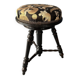 Small black round-cushionstool