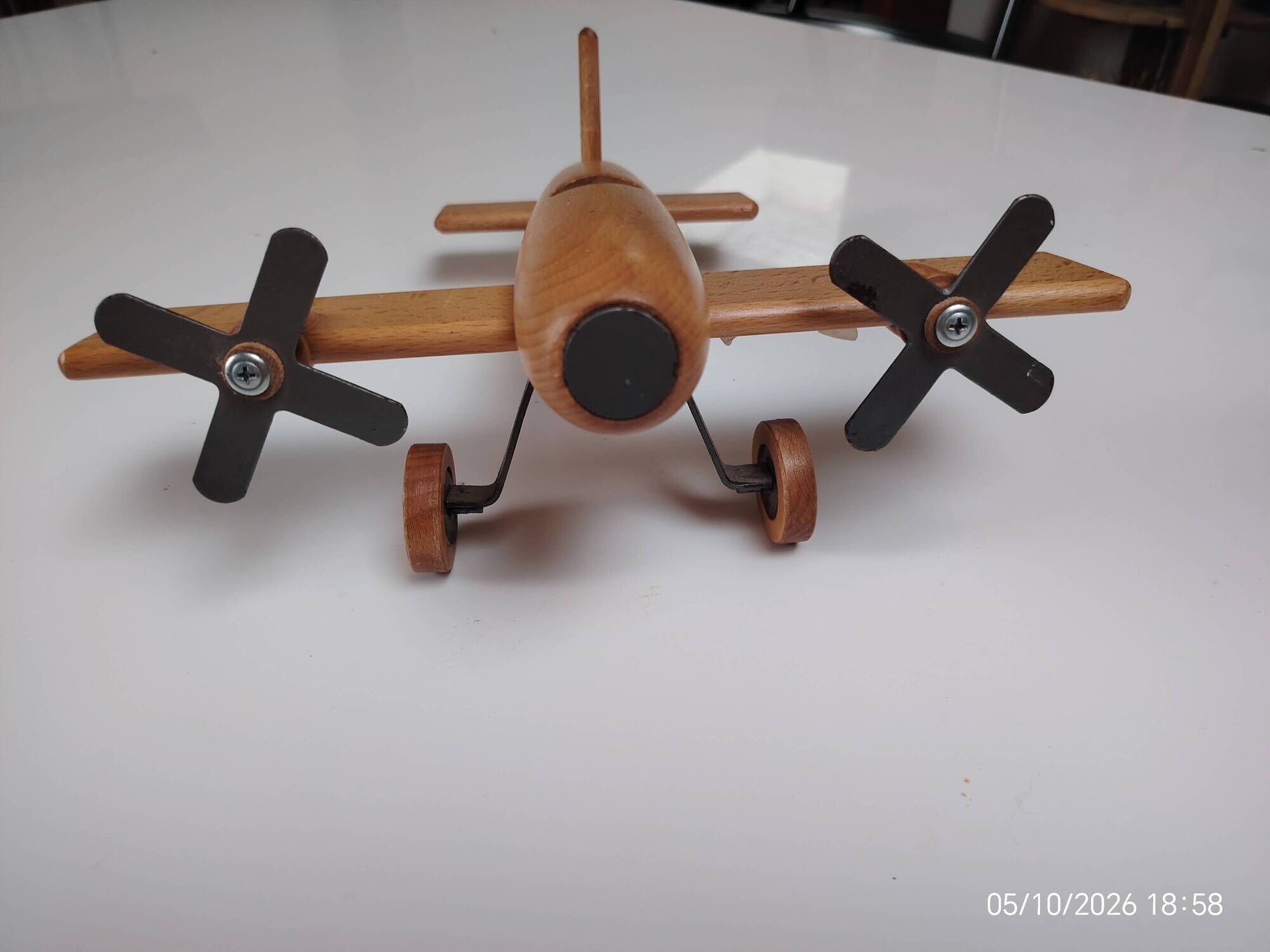 Vintage twin-engine aircraft in solid beech - Moulin Roty (1990s)