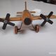 Vintage twin-engine aircraft in solid beech - Moulin Roty (1990s)