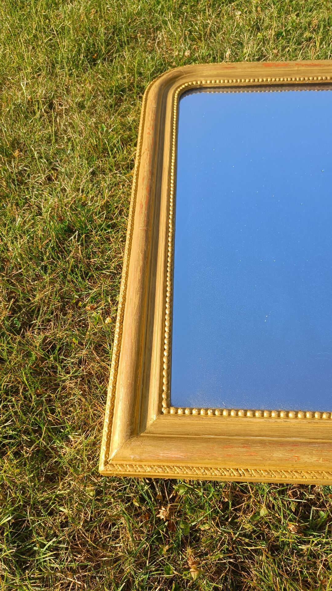 Antique gilded patinated Louis-Philippe mirror