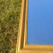 Miroir Louis-Philippe ancien doré patiné