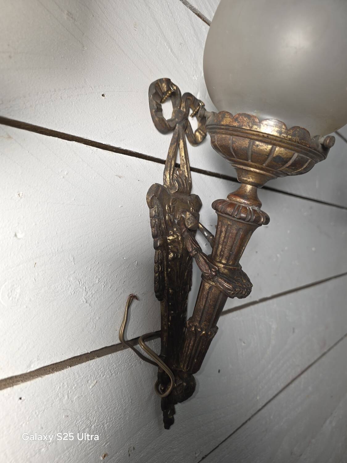 Pair of torch wall lights in Louis XVI style in 19th-century bronze.