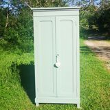 Parisian wardrobe in vintage green wood