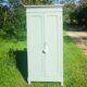 Parisian wardrobe in vintage green wood