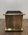 Mirror and gold metal planter