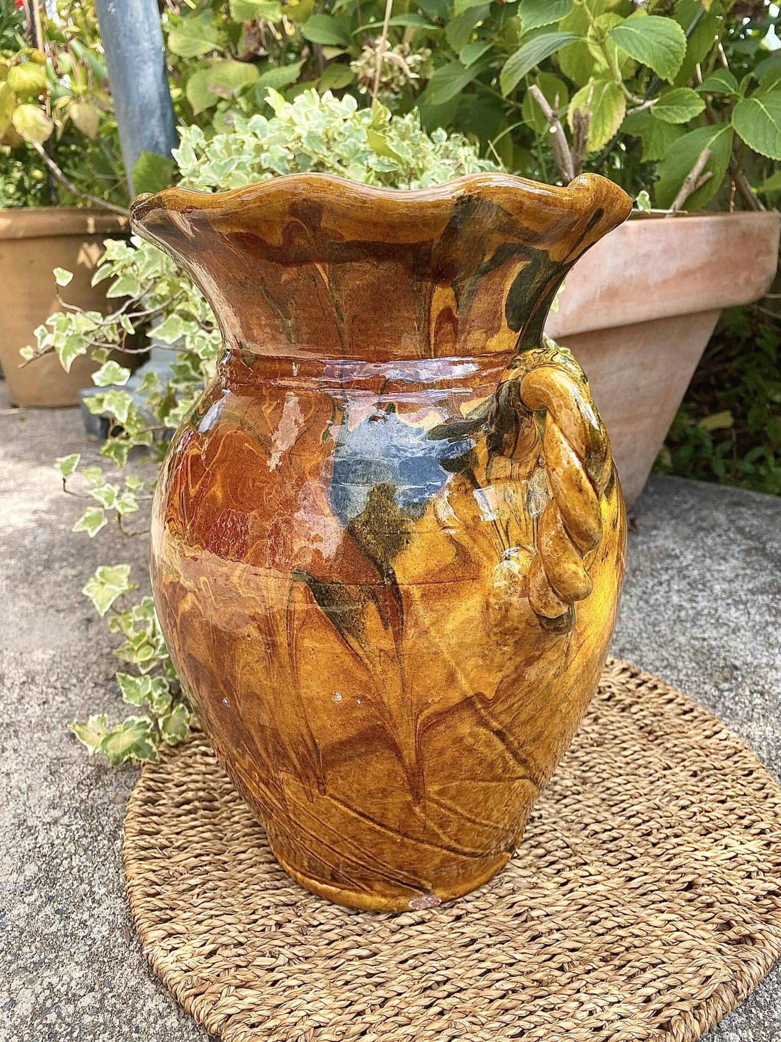 Ancient large vase in glazed speckled terracotta