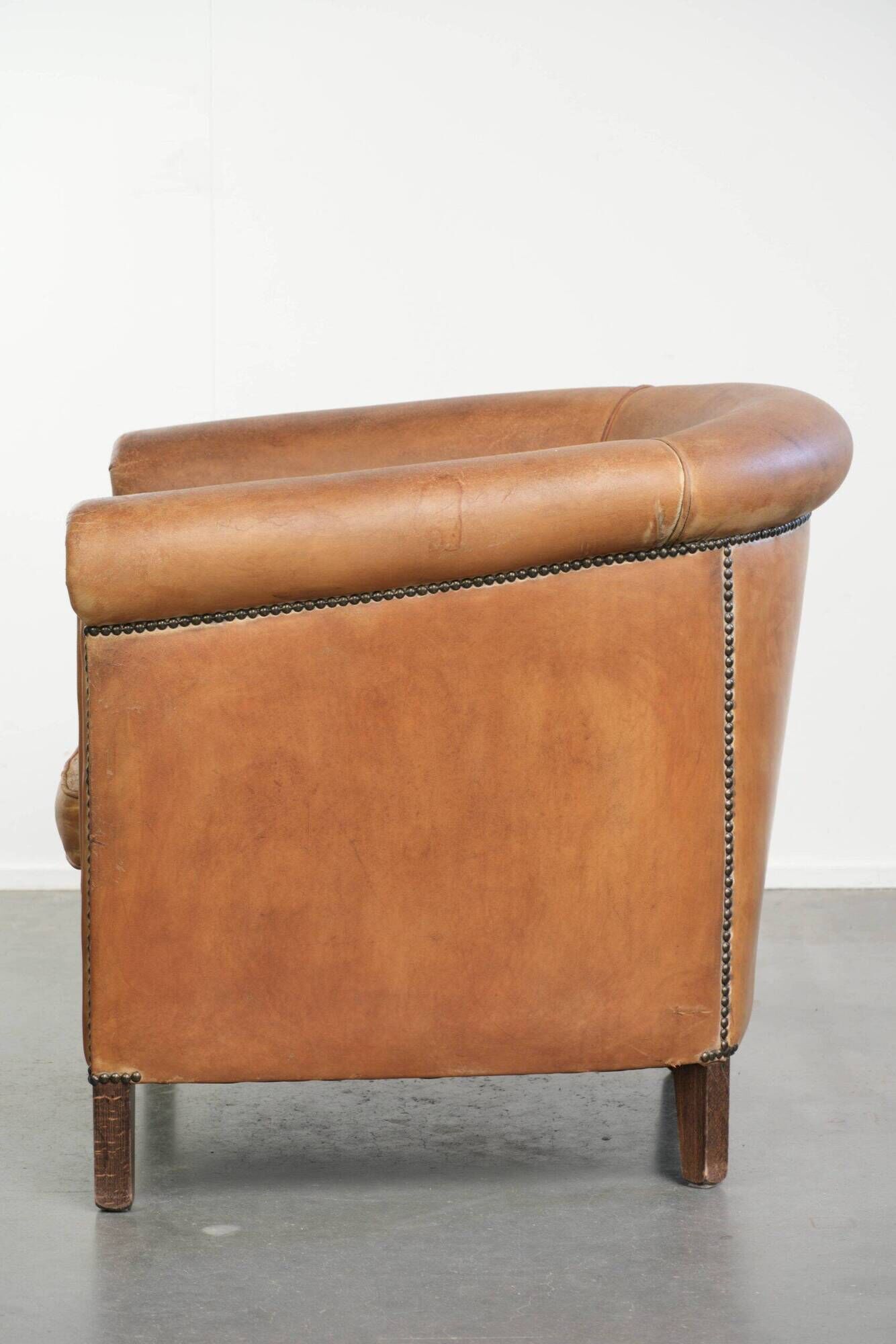 Vintage sheepskin club armchair in a beautiful light cognac colour