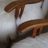 Pair of Scandinavian armchairs in oak and long-haired Icelandic sheepskin by Henning Kjærnulf, 1950.