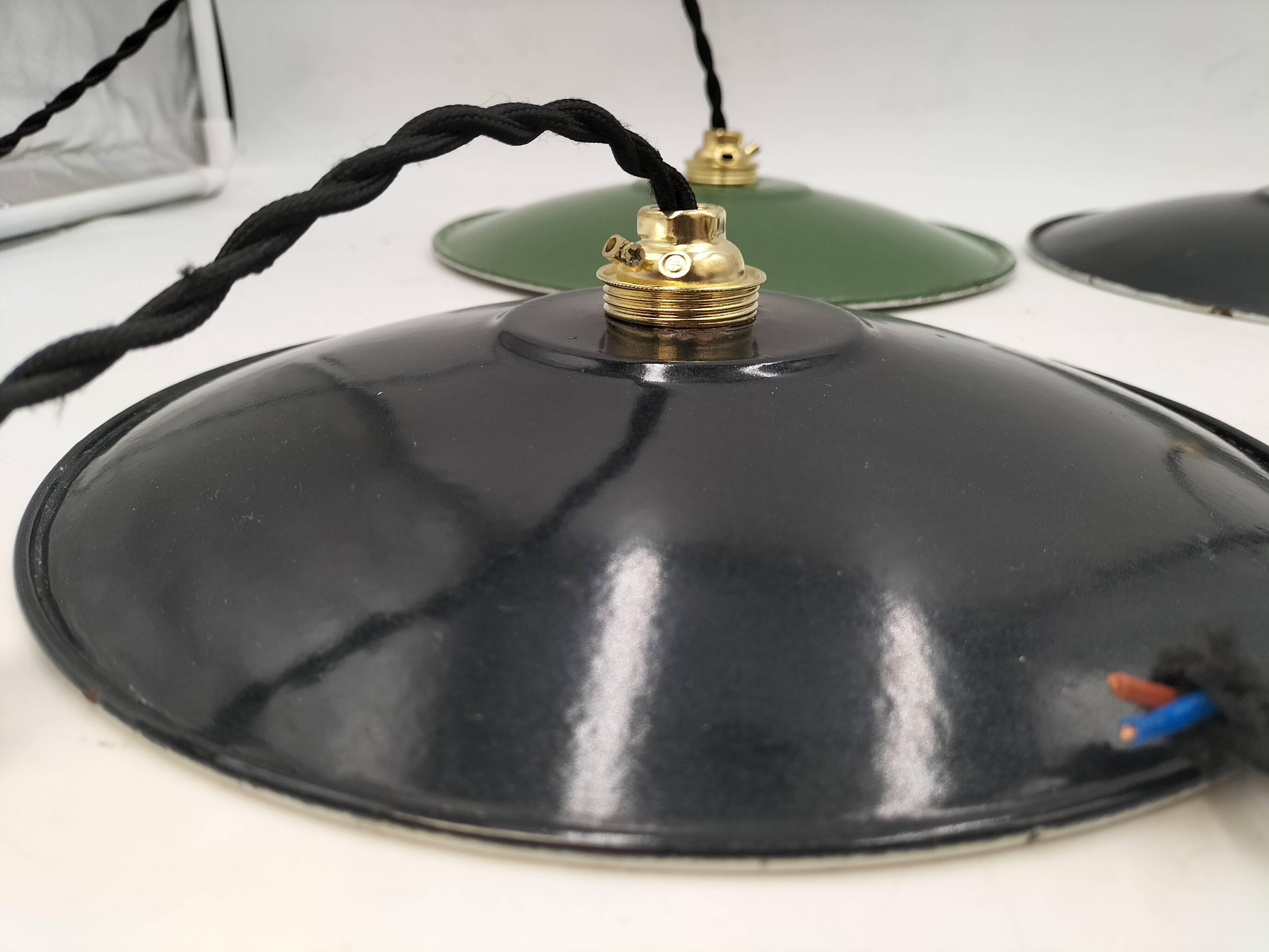 4 enameled sheet metal pendants