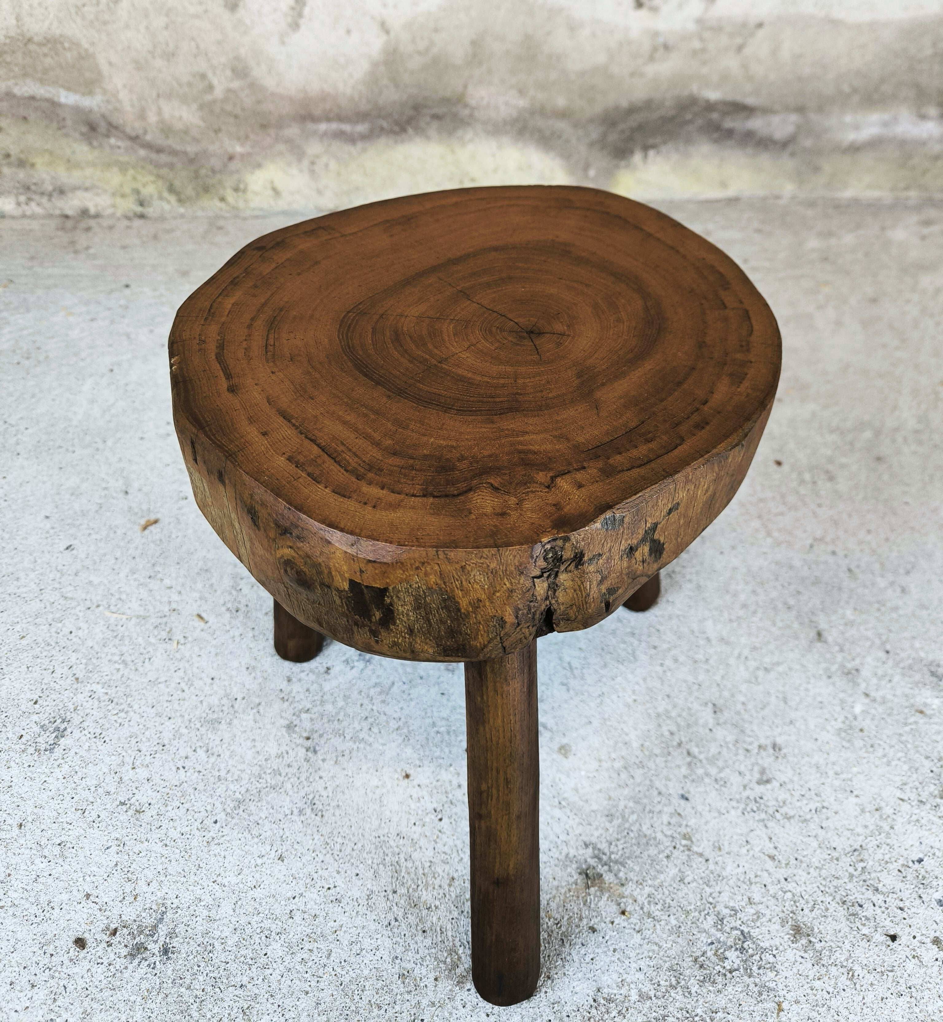 Vintage wooden tripod stool.