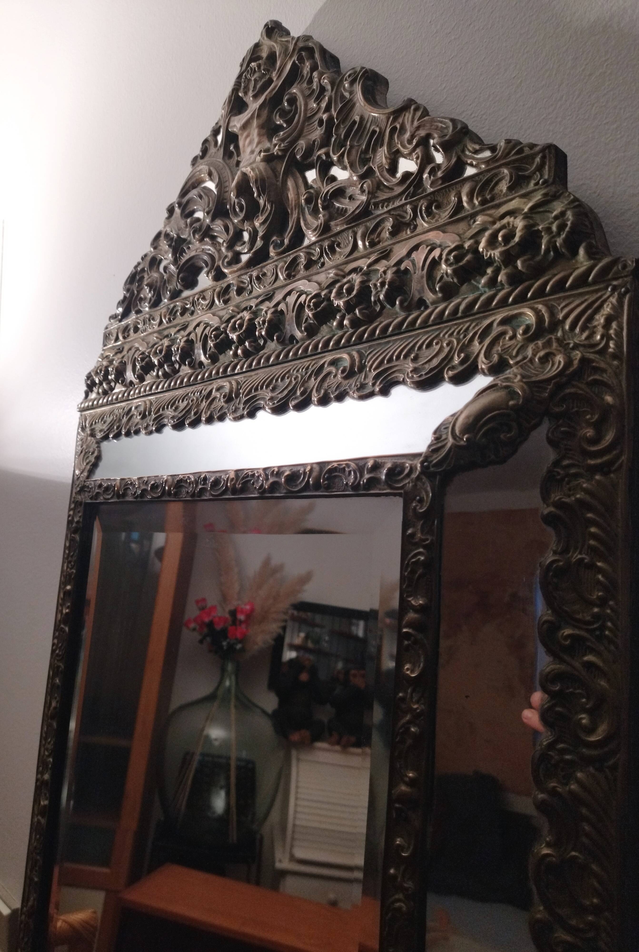 Repelled brass pareclose mirror