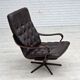 Fauteuil pivotant scandinave des années 1970, en cuir patchwork d'origine.
