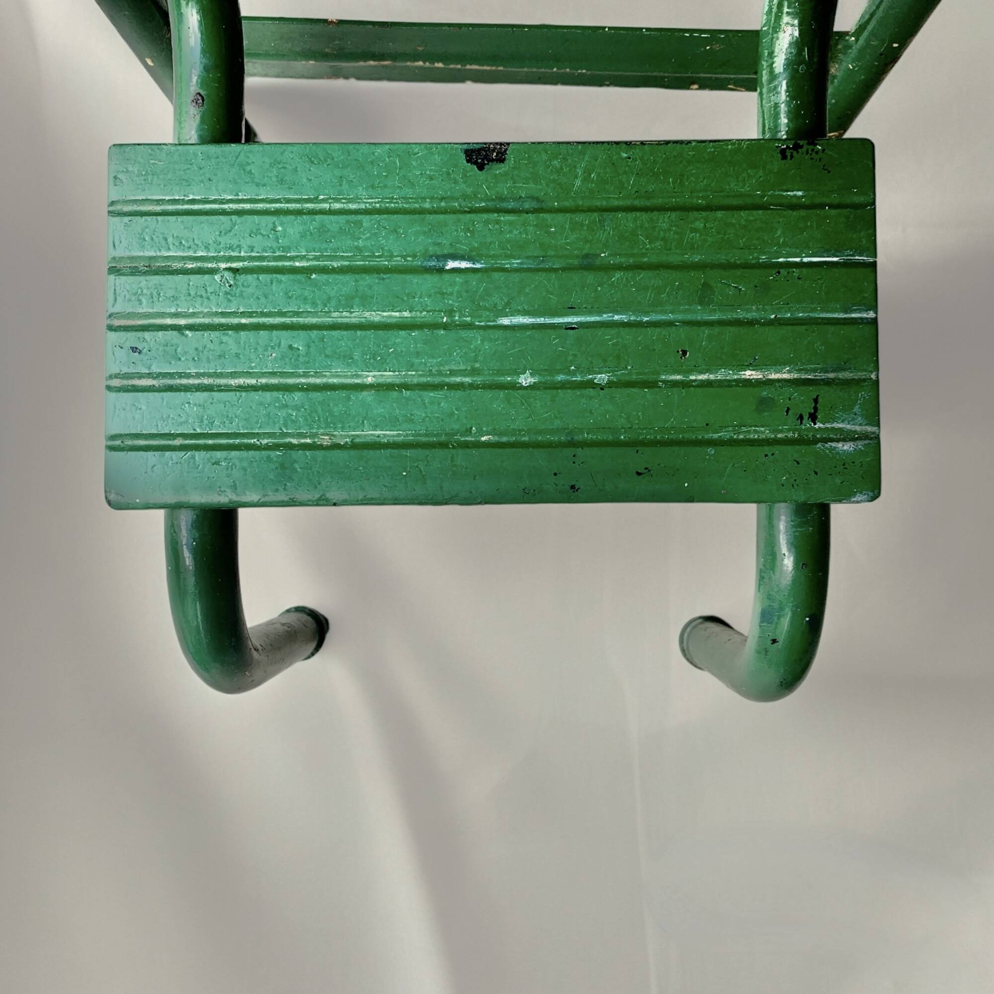 Vintage stepladder in green painted wood and steel
