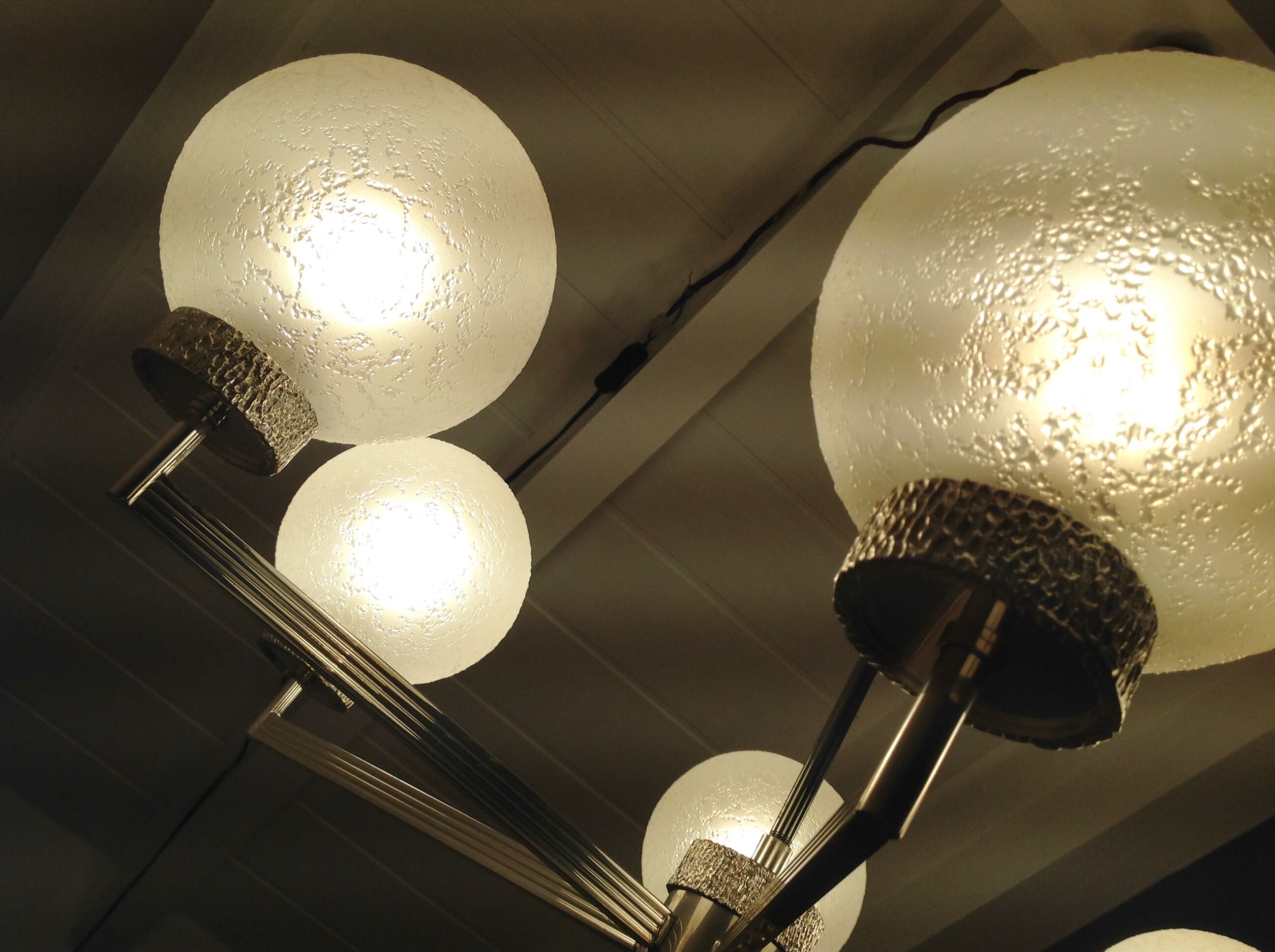 Six-light chrome metal chandelier and opaque glass globes / vintage 60s and 70s