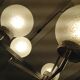 Six-light chrome metal chandelier and opaque glass globes / vintage 60s and 70s