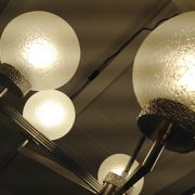 Six-light chrome metal chandelier and opaque glass globes / vintage 60s and 70s