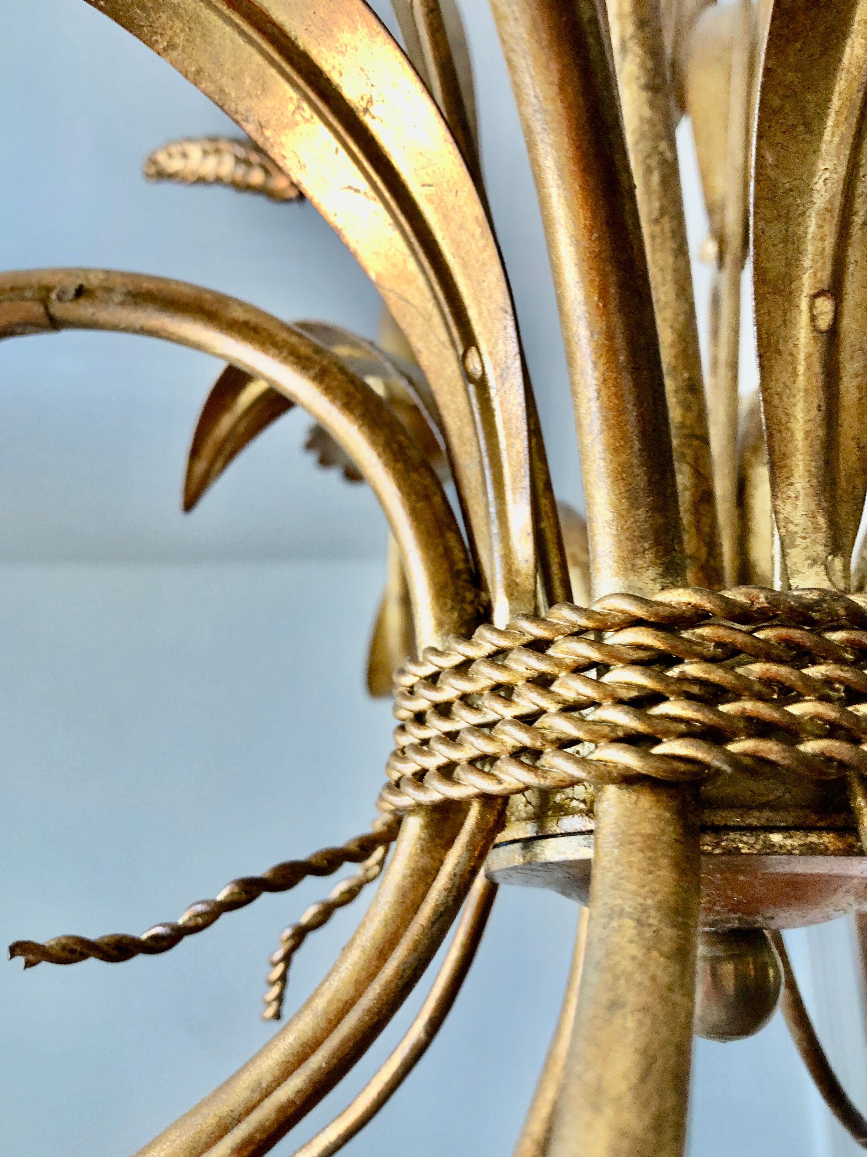 Golden suspension 5 fires with a bouquet of ears of wheat