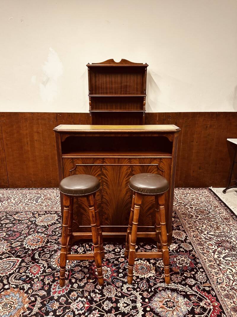 Antique English Chesterfield mahogany bar with bar stools