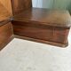 Antique carved wooden dressing table with marble and tilting oval mirror.