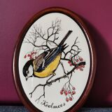 Oval frame bird