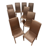 Many brown leather chairs "Roche Bobois"