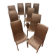 Many brown leather chairs "Roche Bobois"