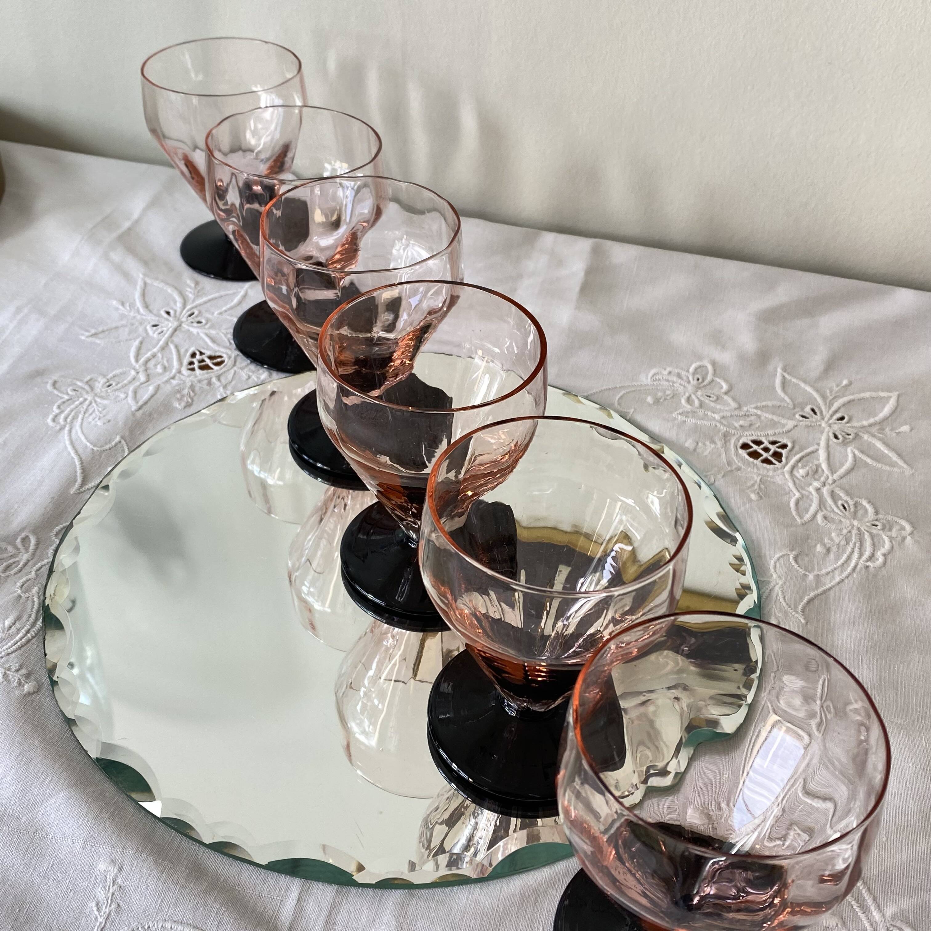 6 Art Deco pink wine or water glasses with black stems.