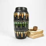 "Fat Lava" vase black background and colorful enamelled drippings