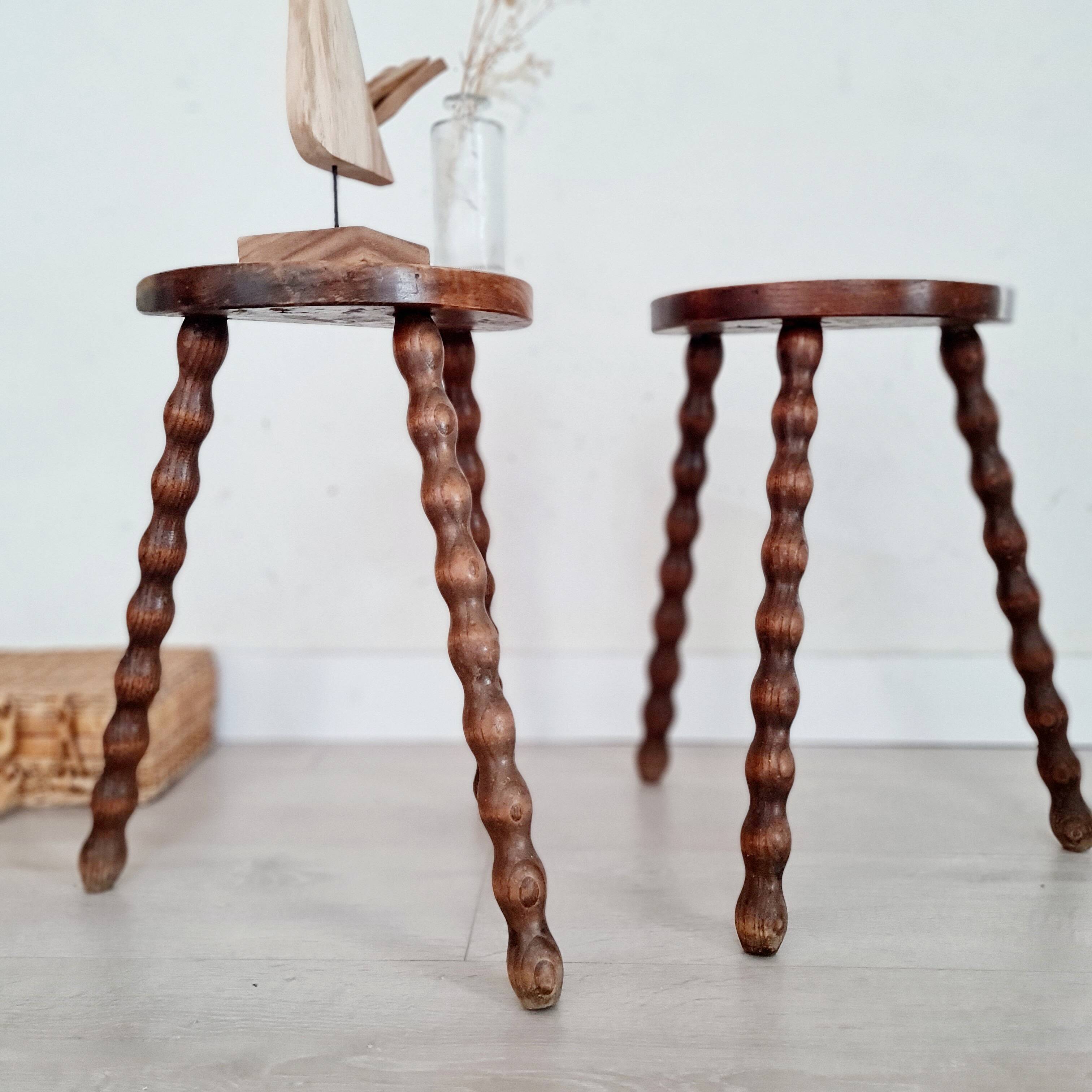 Pair of old wooden tripod stools