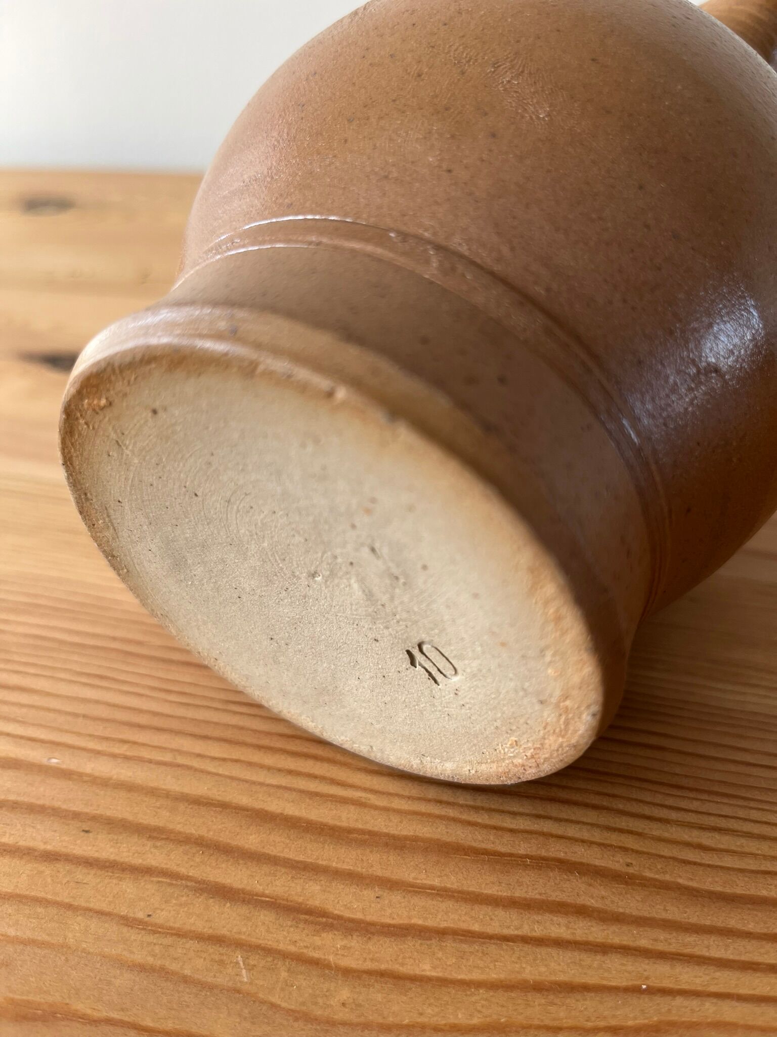 Pitcher in glazed sandstone