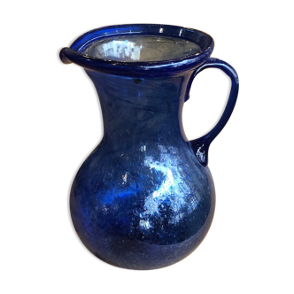 Pitcher made of blown and bubbled glass