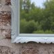 Vintage wall mirror in carved blue-green wood – rococo style – H48 cm