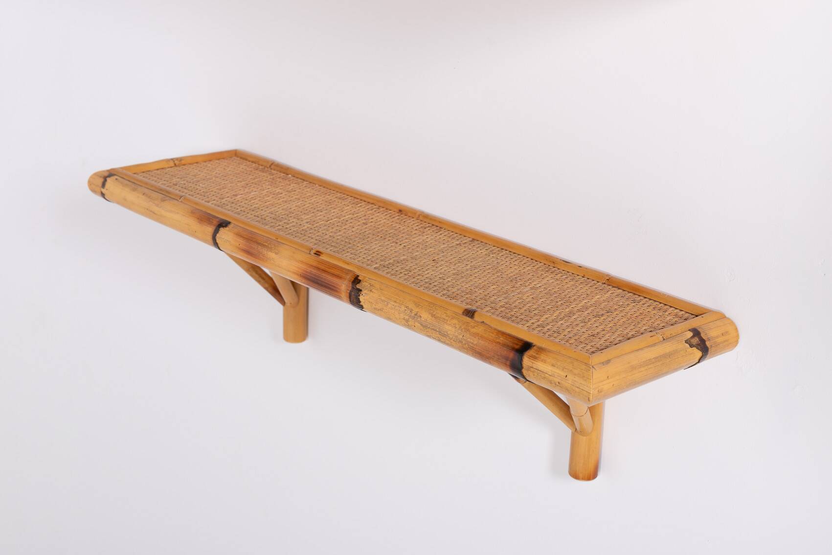 Pair of vintage bamboo-cane wall shelves