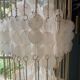 Suspension en pastille de nacre