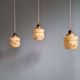 Art Deco trio of suspensions in opaline and marbled ouraline, Scailmont, 1920-30.