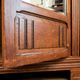 Old solid wood wardrobe with three vintage mirror doors