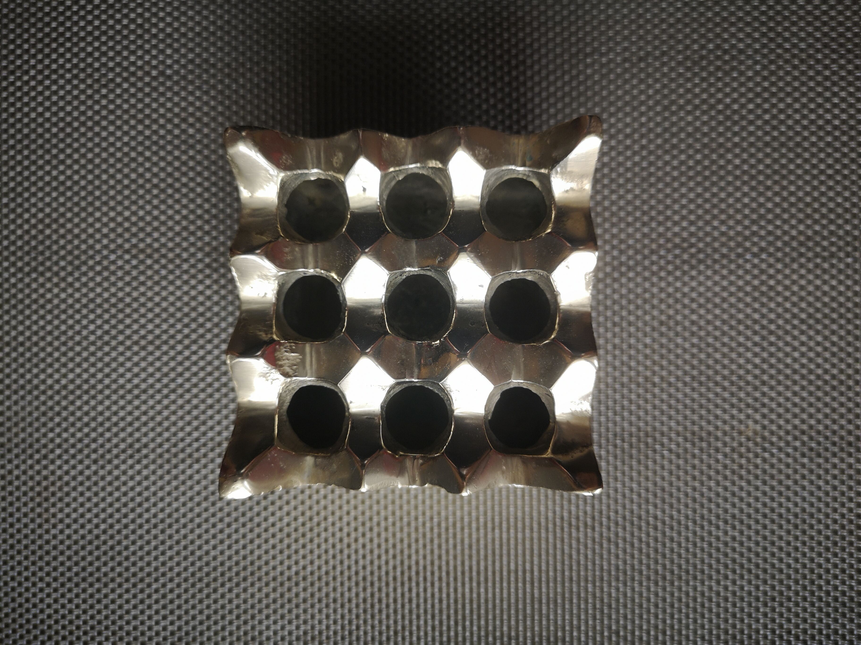 Scandinavian 9-hole brass ashtray 1970/1980