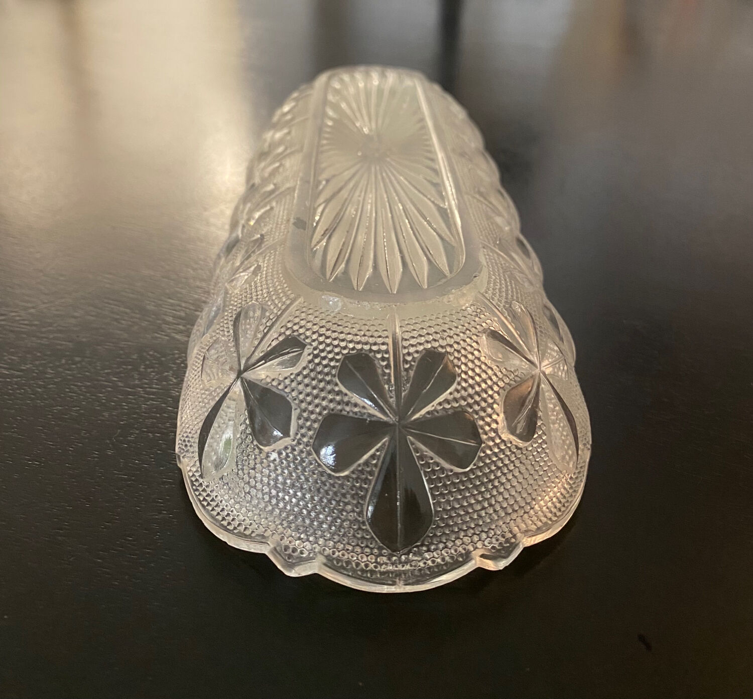 1 Elongated molded glass cup