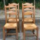 4 solid oak dining chairs with farmhouse straw
