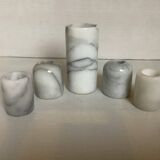 Five marble candlesticks