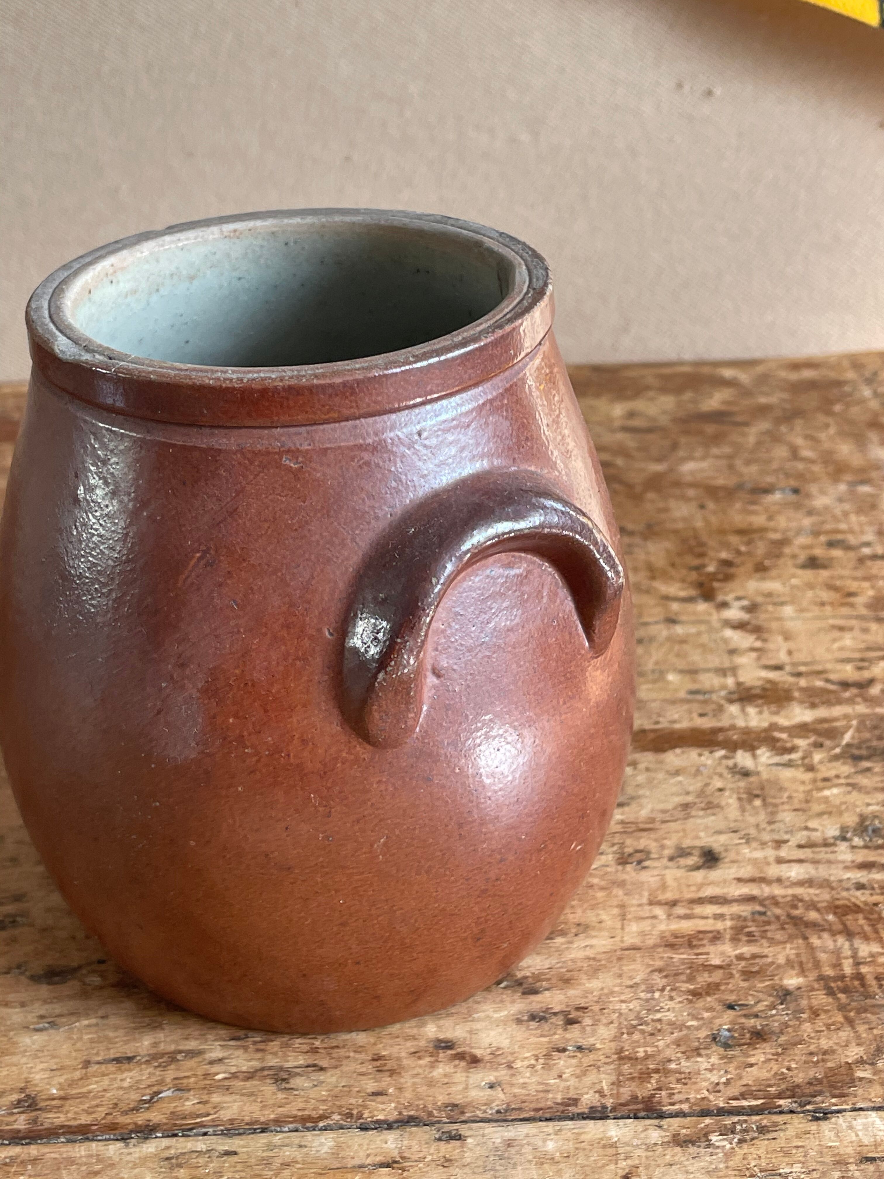 Eared olive pot in brown sandstone
