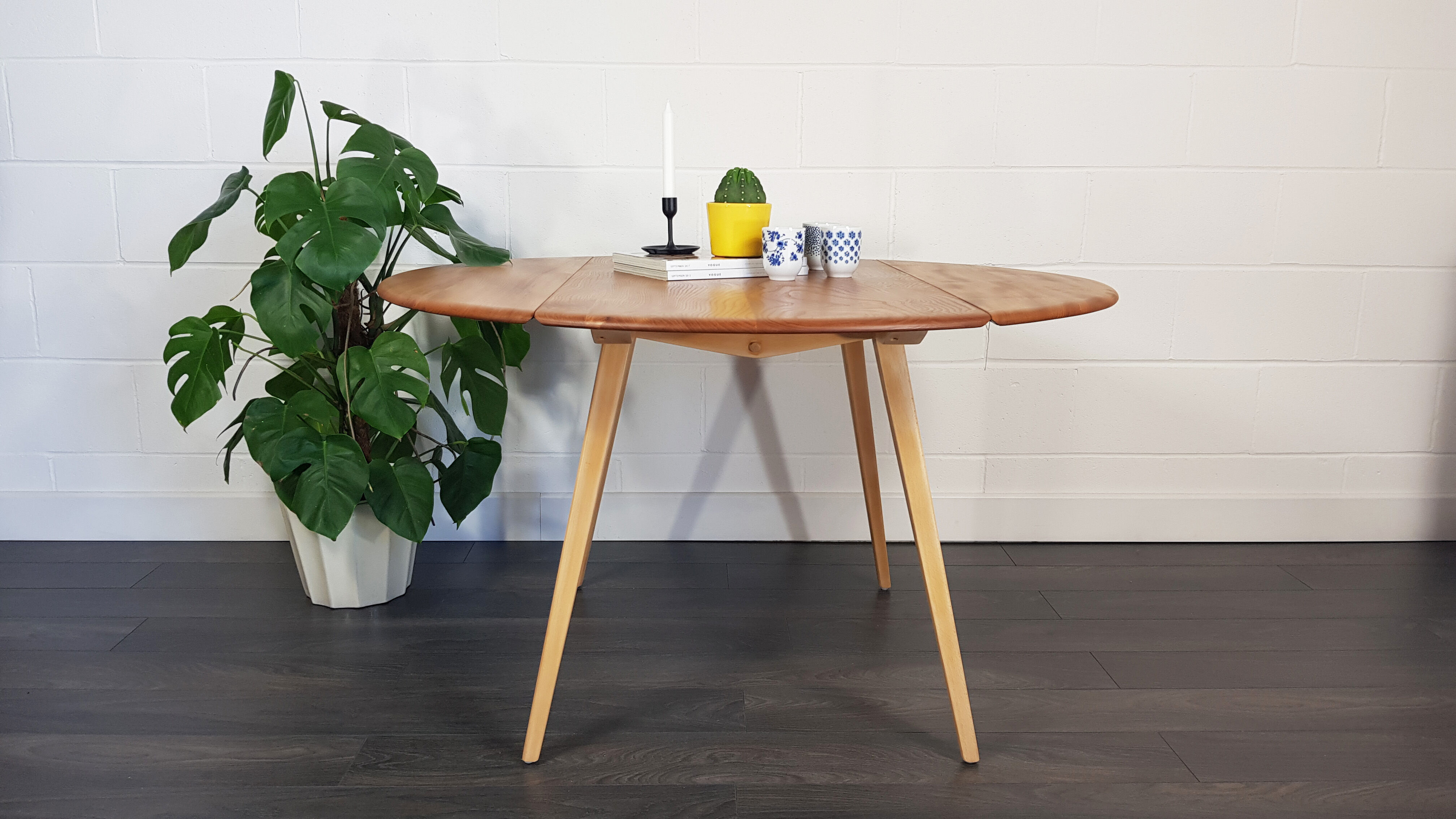 Ercol round drop leaf dining table, 1960s