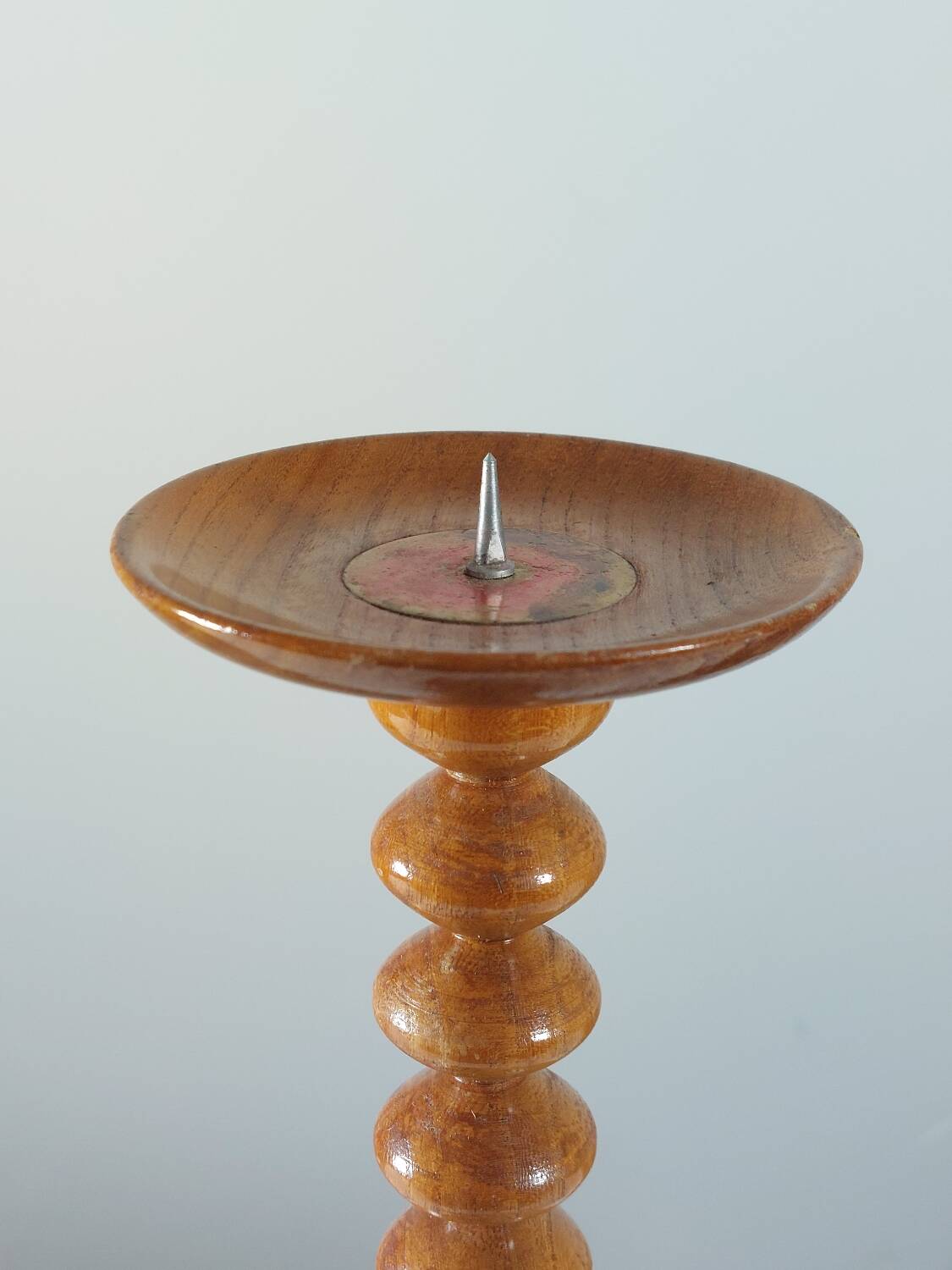 Vintage mid-century wooden candlestick, spool decoration from the 1970s.