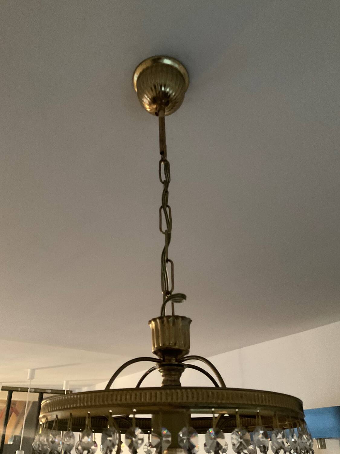 Cascade chandelier with crystal and brass tassels