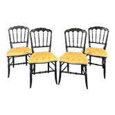 Set of four Napoleon III chairs in blackened wood, 19th century.