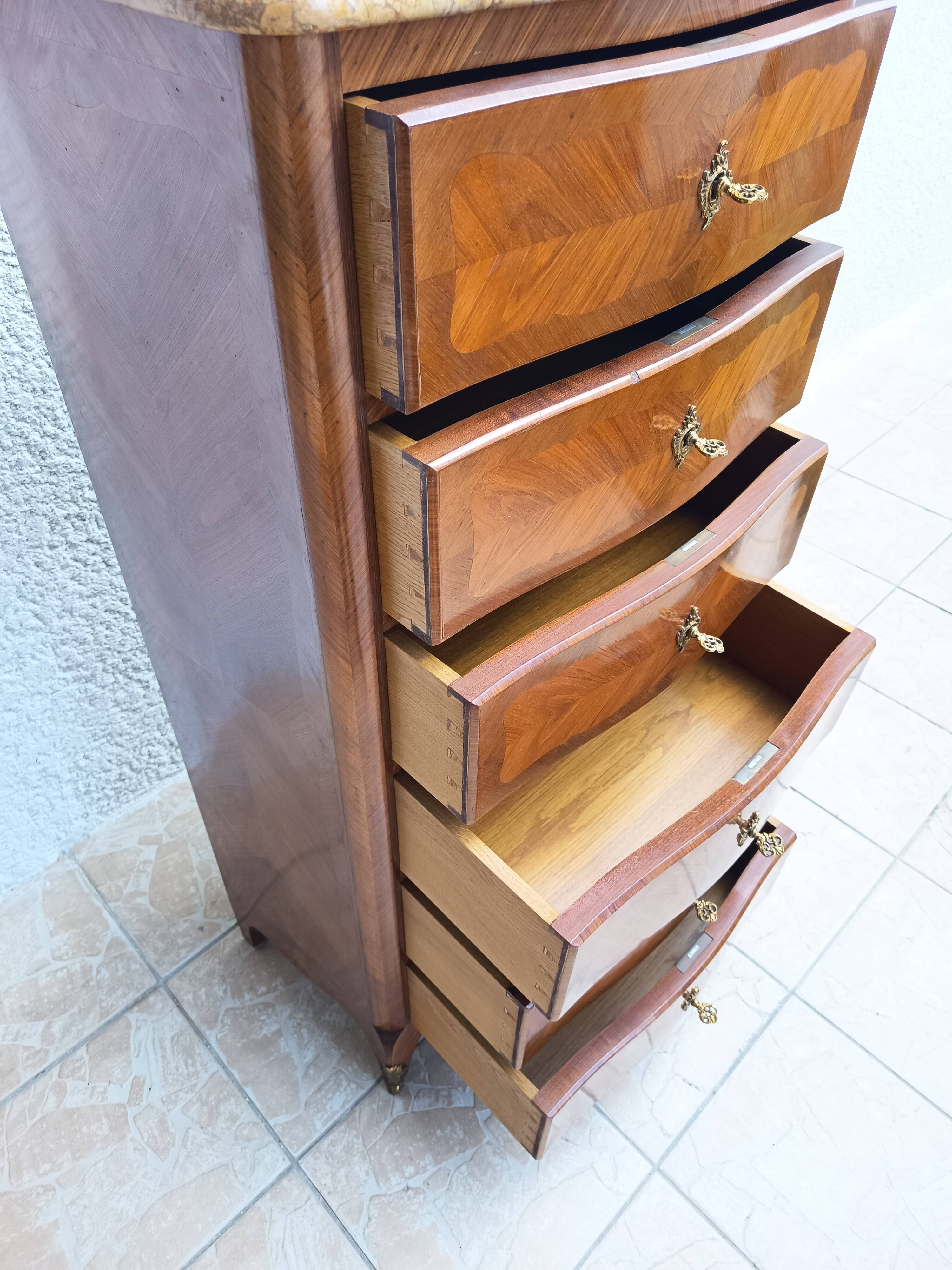Louis XV style chest of drawers in precious wood veneer.