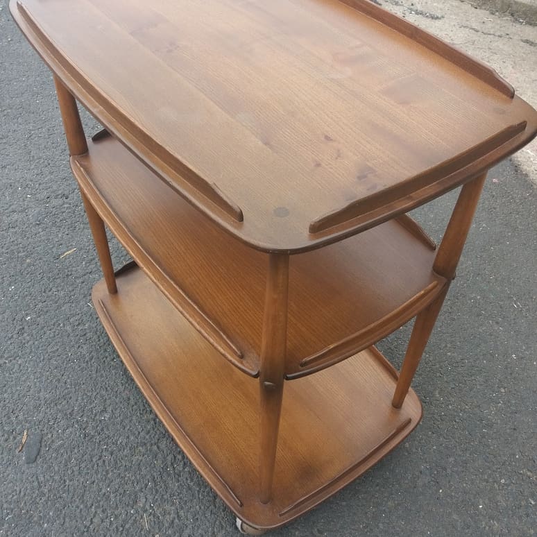 Rolling bar serving table in solid elm by Ercol, England, circa 1960